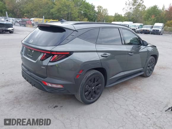 2023 Hyundai Tucson XRT with VIN KM8JFCAE9PU176462, listed as a IAAI auction lot 43299988 with 27,332 mi miles and . Bid and sale history available at DreamBid. Image 4.