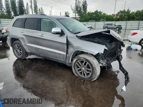 2017 Jeep Grand Cherokee Limited with VIN 1C4RJEBG6HC934007, listed as a Copart auction lot 80958775 with 141,111 mi miles and Salvage title. Bid and sale history available at DreamBid. Image 4.