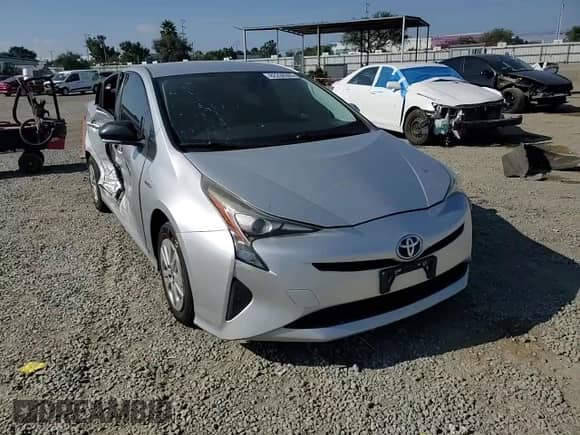 2016 Toyota Prius Two z VIN JTDKBRFUXG3023201, wystawiony jako Copart lot #82238595 z przebiegiem 253 588 mil mil oraz Szkoda całkowita • Salvage title. Historia ofert i sprzedaży dostępna na DreamBid. Obrazek 13.