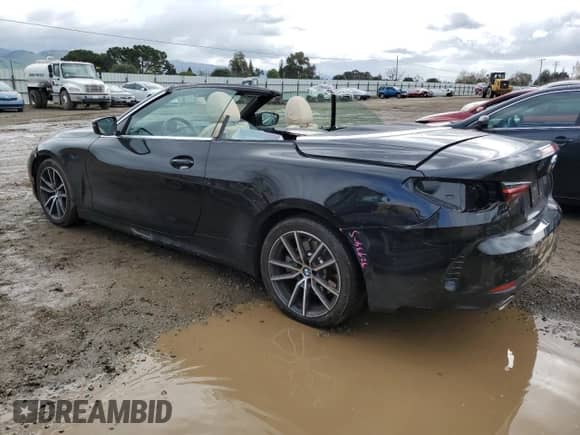 2022 BMW 4 Series 430i with VIN WBA23AT03NCJ32884, listed as a Copart auction lot 48077065 with 12,910 mi miles and Salvage title. Bid and sale history available at DreamBid. Image 2.