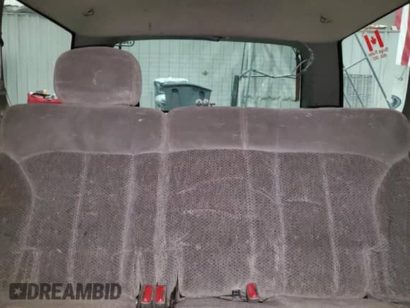 2000 Chevrolet Blazer LS z VIN 1GNCS13W7YK297644, wystawiony jako Copart lot #70089505 z przebiegiem 264 962 mil mil oraz Szkoda całkowita • Salvage title. Historia ofert i sprzedaży dostępna na DreamBid. Obrazek 10.