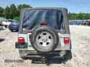 2002 Jeep Wrangler X with VIN 1J4FA39S02P750998, listed as a Copart auction lot 66619075 with 98,985 mi miles and Clean title. Bid and sale history available at DreamBid. Image 6.