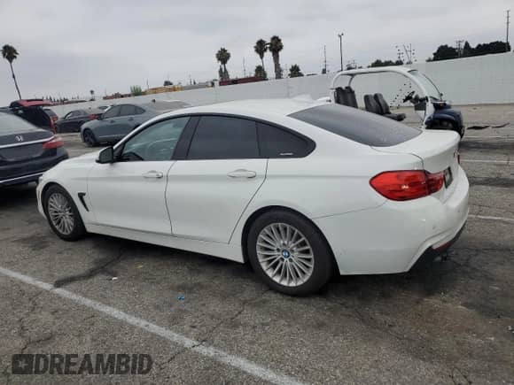 2015 BMW 4 Series 428i z VIN WBA4A9C55FGL86065, wystawiony jako Copart lot #63860745 z przebiegiem 104 417 mil mil oraz Szkoda całkowita • Salvage title. Historia ofert i sprzedaży dostępna na DreamBid. Obrazek 2.