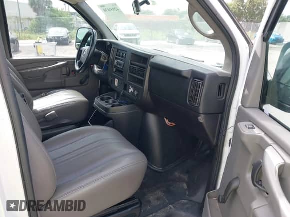 2014 Chevrolet Express Cargo with VIN 1GCSGAFX4E1163198, listed as a IAAI auction lot 42931630 with 247,808 mi miles and . Bid and sale history available at DreamBid. Image 5.