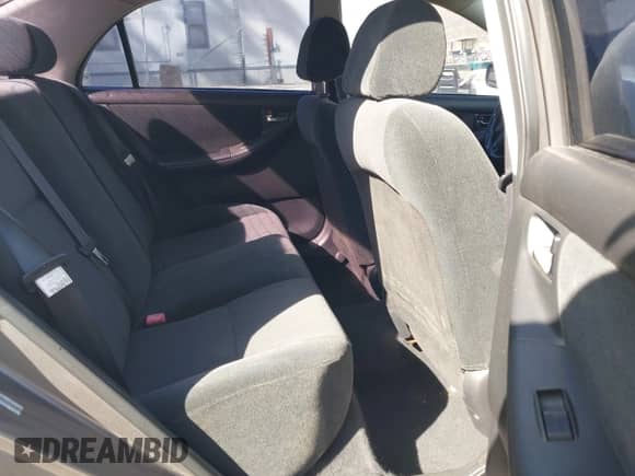 2004 Toyota Corolla CE with VIN 1NXBR32E84Z310058, listed as a IAAI auction lot 43090508 with 217,147 mi miles and . Bid and sale history available at DreamBid. Image 8.