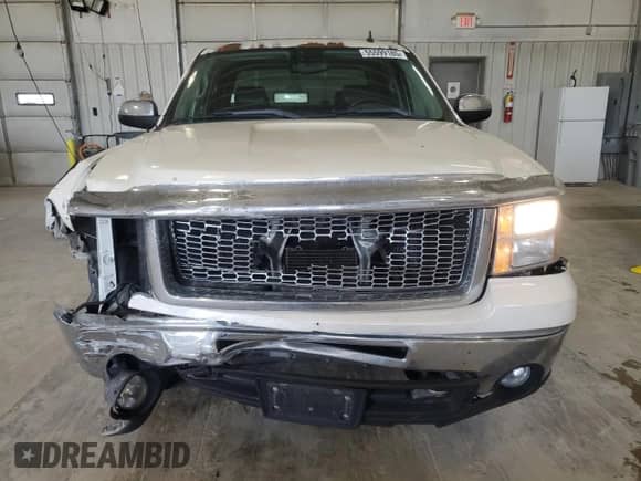 2013 GMC Sierra 1500 SLT с VIN 3GTP2WE79DG156685, выставлен на аукционе Copart как лот 55599185 с пробегом 220 968 миль миль и Списание • Salvage title. История ставок и продаж доступна на DreamBid. Изображение 5.