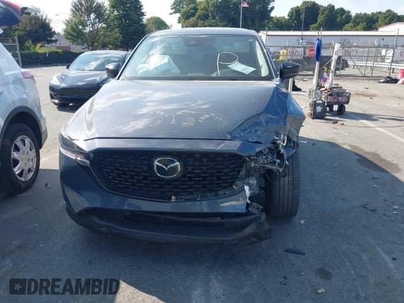 2023 Mazda CX-5 S Carbon Edition z VIN JM3KFBCM6P0252838, wystawiony jako IAAI lot #43248566 z przebiegiem 37 599 mil mil oraz . Historia ofert i sprzedaży dostępna na DreamBid. Obrazek 12.