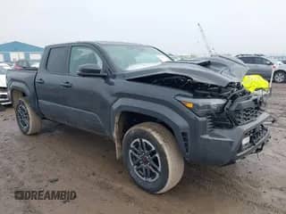 2024 Toyota Tacoma SR5 with VIN 3TMLB5JNXRM055645, listed as a IAAI auction lot 41208771 with 984 mi miles and . Bid and sale history available at DreamBid. Image 1.