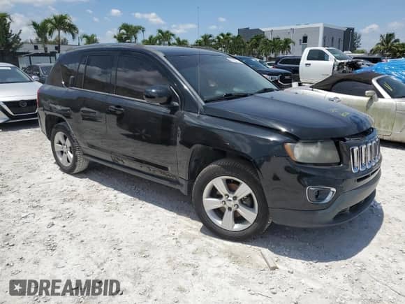 2015 Jeep Compass High Altitude with VIN 1C4NJCEA0FD178823, listed as a Copart auction lot 57904775 with 106,240 mi miles and Salvage title. Bid and sale history available at DreamBid. Image 4.