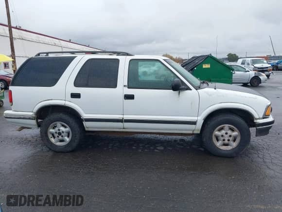 1997 Chevrolet Blazer LS with VIN 1GNDT13W6VK189352, listed as a IAAI auction lot 40867780 with 170,552 mi miles and . Bid and sale history available at DreamBid. Image 13.