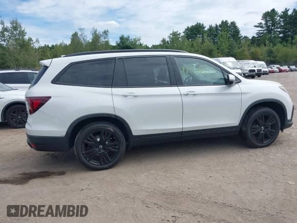 2021 Honda Pilot Black Edition z VIN 5FNYF6H74MB061770, wystawiony jako IAAI lot #42731283 z przebiegiem 61 281 mil mil oraz . Historia ofert i sprzedaży dostępna na DreamBid. Obrazek 13.