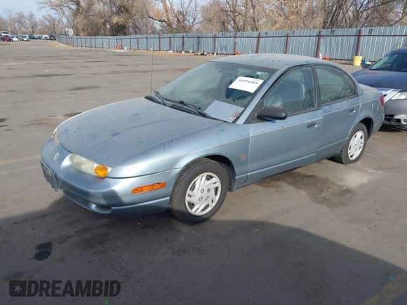 2002 Saturn SL with VIN 1G8ZS52802Z252972, listed as a IAAI auction lot 41094484 with 341,794 mi miles and . Bid and sale history available at DreamBid. Image 2.