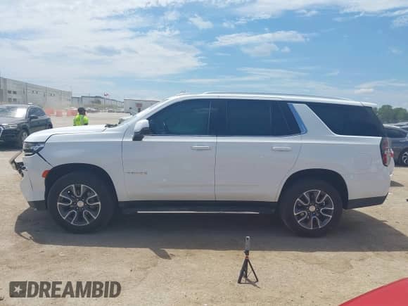 2022 Chevrolet Tahoe LT with VIN 1GNSCNKD2NR130367, listed as a IAAI auction lot 42830210 with 102,005 mi miles and . Bid and sale history available at DreamBid. Image 14.