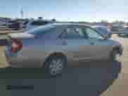 2002 Toyota Camry LE z VIN 4T1BE32K82U588621, wystawiony jako Copart lot #86985085 z przebiegiem 252 745 mil mil oraz Szkoda całkowita • Salvage title. Historia ofert i sprzedaży dostępna na DreamBid. Obrazek 3.