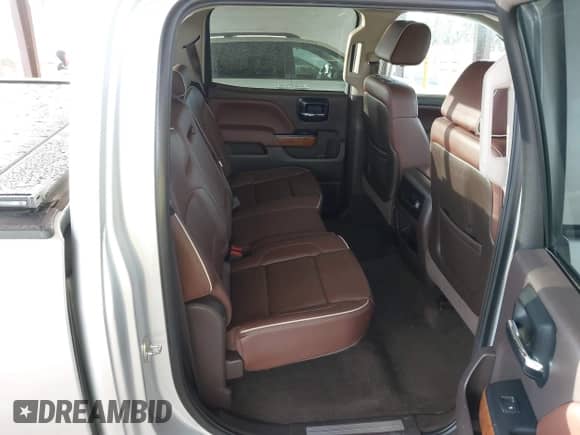 2014 Chevrolet Silverado 1500 High Country z VIN 3GCUKTEJXEG271648, wystawiony jako IAAI lot #43452051 z przebiegiem 119 705 mil mil oraz . Historia ofert i sprzedaży dostępna na DreamBid. Obrazek 8.