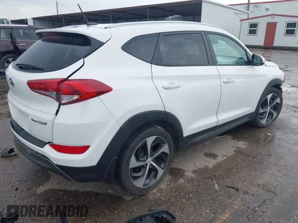 2016 Hyundai Tucson Limited z VIN KM8J33A23GU263319, wystawiony jako IAAI lot #42714532 z przebiegiem Nie podano mil oraz . Historia ofert i sprzedaży dostępna na DreamBid. Obrazek 4.