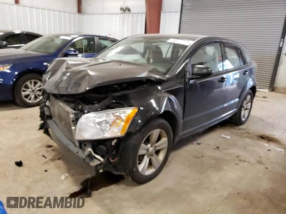 2010 Dodge Caliber SXT z VIN 1B3CB4HA7AD619122, wystawiony jako Copart lot #36925394 z przebiegiem 132 315 mil mil oraz Czysty tytuł • Clean title. Historia ofert i sprzedaży dostępna na DreamBid. Obrazek 1.