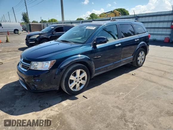 2014 Dodge Journey Limited with VIN 3C4PDCDG6ET151768, listed as a Copart auction lot 66884405 with 214,339 mi miles and Clean title. Bid and sale history available at DreamBid. Image 1.