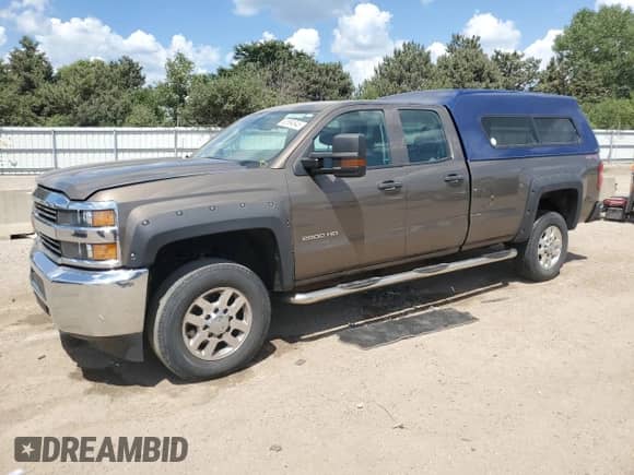 2015 Chevrolet Silverado 2500HD Work Truck z VIN 1GC2KUEG2FZ504361, wystawiony jako Copart lot #62994945 z przebiegiem 251 103 mil mil oraz Szkoda całkowita • Salvage title. Historia ofert i sprzedaży dostępna na DreamBid. Obrazek 1.