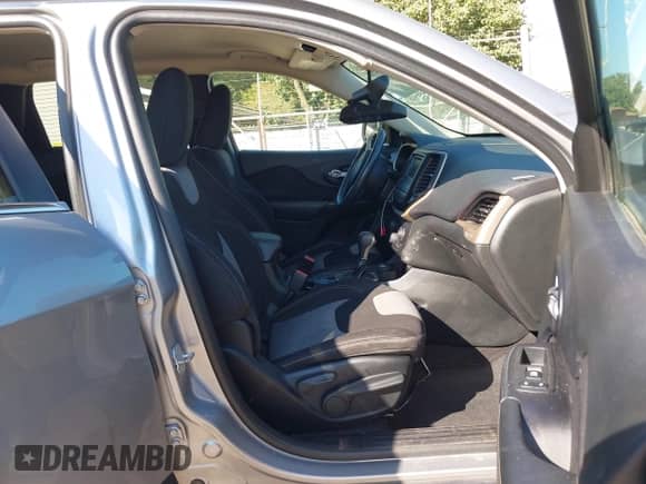 2014 Jeep Cherokee Latitude with VIN 1C4PJMCBXEW308071, listed as a IAAI auction lot 43196539 with 116,051 mi miles and . Bid and sale history available at DreamBid. Image 5.