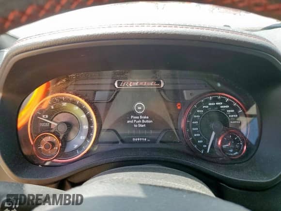 2020 Ram 1500 Rebel z VIN 1C6SRFLT2LN199221, wystawiony jako Copart lot #68965755 z przebiegiem 49 714 mil mil oraz Szkoda całkowita • Salvage title. Historia ofert i sprzedaży dostępna na DreamBid. Obrazek 9.