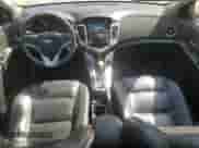 2014 Chevrolet Cruze 2LT z VIN 1G1PE5SB7E7134961, wystawiony jako Copart lot #80958165 z przebiegiem 154 313 mil mil oraz Szkoda całkowita • Salvage title. Historia ofert i sprzedaży dostępna na DreamBid. Obrazek 8.