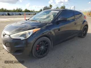 2013 Hyundai Veloster w/Black Int z VIN KMHTC6AD8DU147119, wystawiony jako Copart lot #82261415 z przebiegiem 132 516 mil mil oraz Szkoda całkowita • Salvage title. Historia ofert i sprzedaży dostępna na DreamBid. Obrazek 1.