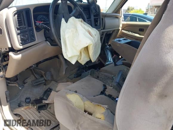 2004 GMC Sierra 1500 SLE z VIN 2GTEC19T141264533, wystawiony jako IAAI lot #42201912 z przebiegiem Nie podano mil oraz . Historia ofert i sprzedaży dostępna na DreamBid. Obrazek 5.
