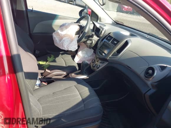 2013 Chevrolet Sonic LT with VIN 1G1JC6SBXD4249992, listed as a IAAI auction lot 42667093 with 53,007 mi miles and . Bid and sale history available at DreamBid. Image 5.