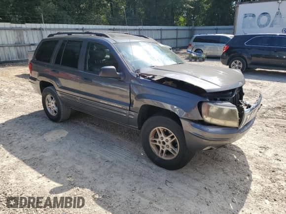 2002 Jeep Grand Cherokee с VIN 1J8GX48S12C255290, выставлен на аукционе Copart как лот 57832025 с пробегом 191 293 миль миль и На запчасти • Non repairable. История ставок и продаж доступна на DreamBid. Изображение 4.