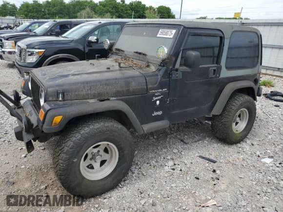 2000 Jeep Wrangler Sport z VIN 1J4FA49S7YP741858, wystawiony jako Copart lot #59058075 z przebiegiem 223 876 mil mil oraz Czysty tytuł • Clean title. Historia ofert i sprzedaży dostępna na DreamBid. Obrazek 1.