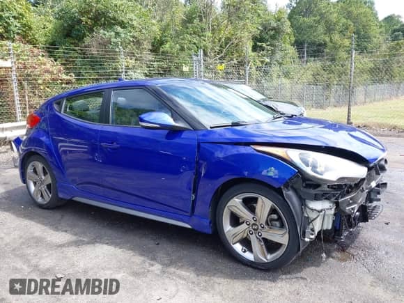 2013 Hyundai Veloster Turbo с VIN KMHTC6AE0DU141811, выставлен на аукционе IAAI как лот 43188913 с пробегом 117 067 миль миль и . История ставок и продаж доступна на DreamBid. Изображение 13.