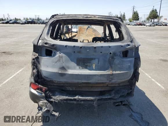 2018 Hyundai Santa Fe 2.0T with VIN 5NMZU4LA3JH106130, listed as a Copart auction lot 62910625 with Not provided miles and Salvage title. Bid and sale history available at DreamBid. Image 6.
