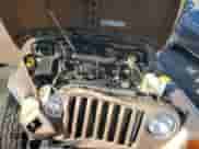 1999 Jeep Wrangler Sport with VIN 1J4FY19S9XP417531, listed as a Copart auction lot 86538315 with 161,004 mi miles and Salvage title. Bid and sale history available at DreamBid. Image 12.