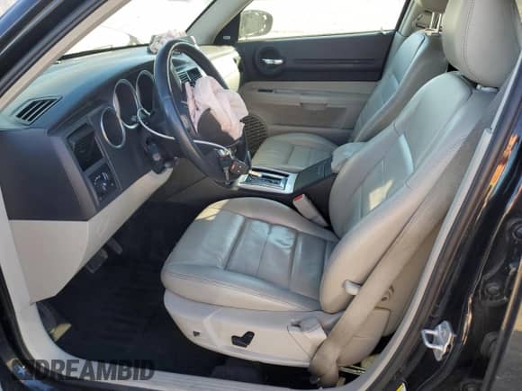2007 Dodge Magnum R/T with VIN 2D4GV572X7H636230, listed as a Copart auction lot 77421474 with 120,317 mi miles and Salvage title. Bid and sale history available at DreamBid. Image 7.