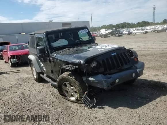 2010 Jeep Wrangler Sport с VIN 1J4AA2D13AL111104, выставлен на аукционе Copart как лот 84287605 с пробегом 110 407 миль миль и Списание • Salvage title. История ставок и продаж доступна на DreamBid. Изображение 14.