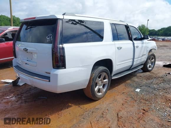 2017 Chevrolet Suburban Premier z VIN 1GNSCJKCXHR204770, wystawiony jako IAAI lot #42262898 z przebiegiem 166 304 mil mil oraz . Historia ofert i sprzedaży dostępna na DreamBid. Obrazek 4.