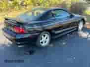 1996 Ford Mustang GT z VIN 1FALP42XXTF205861, wystawiony jako Copart lot #90483745 z przebiegiem 87 824 mil mil oraz Szkoda całkowita • Salvage title. Historia ofert i sprzedaży dostępna na DreamBid. Obrazek 4.