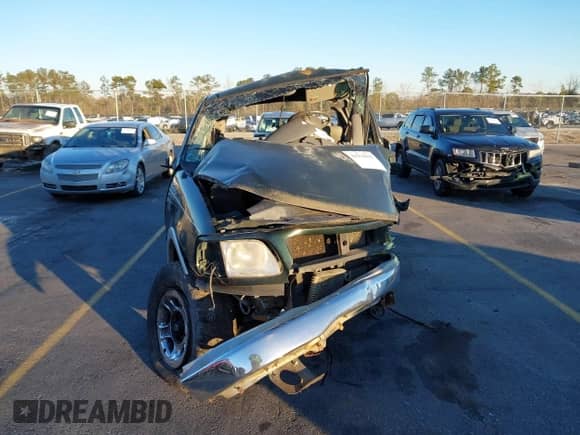 2002 Ford F-150 XLT с VIN 1FTRW07L62KC97448, выставлен на аукционе IAAI как лот 41276502 с пробегом Не указан миль и . История ставок и продаж доступна на DreamBid. Изображение 12.