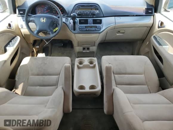 2006 Honda Odyssey EX z VIN 5FNRL38446B439803, wystawiony jako Copart lot #58628095 z przebiegiem 198 483 mil mil oraz Szkoda całkowita • Salvage title. Historia ofert i sprzedaży dostępna na DreamBid. Obrazek 8.