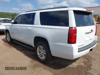 2017 Chevrolet Suburban LT z VIN 1GNSCHKCXHR204227, wystawiony jako IAAI lot #43412983 z przebiegiem 278 413 mil mil oraz . Historia ofert i sprzedaży dostępna na DreamBid. Obrazek 3.