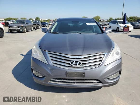 2013 Hyundai Azera с VIN KMHFH4JGXDA322985, выставлен на аукционе Copart как лот 74611094 с пробегом 79 230 миль миль и Чистый • Clean title. История ставок и продаж доступна на DreamBid. Изображение 5.