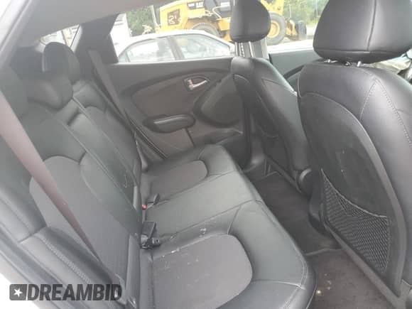 2012 Hyundai Tucson GLS with VIN KM8JU3AC9CU519897, listed as a Copart auction lot 70883845 with 62,802 mi miles and Salvage title. Bid and sale history available at DreamBid. Image 11.