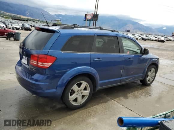 2010 Dodge Journey SXT with VIN 3D4PH5FV9AT138814, listed as a Copart auction lot 70632775 with 129,836 mi miles and Clean title. Bid and sale history available at DreamBid. Image 3.