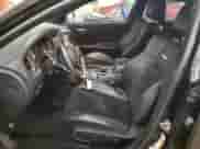 2014 Dodge Charger SRT-8 с VIN 2C3CDXEJ6EH283569, выставлен на аукционе Copart как лот 77036274 с пробегом 77 356 миль миль и Списание • Salvage title. История ставок и продаж доступна на DreamBid. Изображение 7.