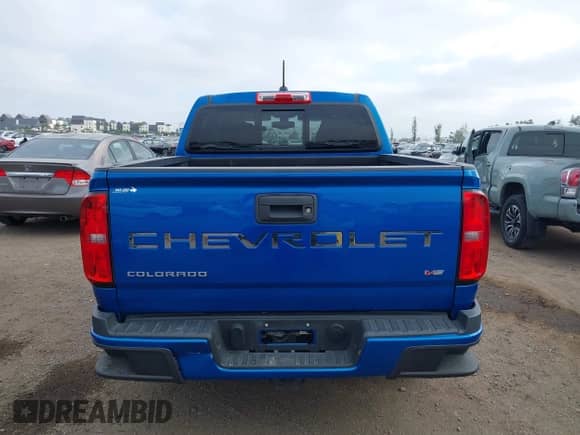 2021 Chevrolet Colorado 2WD LT with VIN 1GCGSCEN6M1122960, listed as a IAAI auction lot 42261871 with 14,472 mi miles and . Bid and sale history available at DreamBid. Image 17.