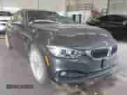 2015 BMW 4 Series 428i xDrive with VIN WBA4A7C52FD414734, listed as a IAAI auction lot 42377682 with 129,264 mi miles and . Bid and sale history available at DreamBid. Image 1.