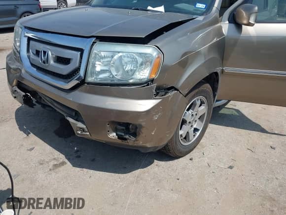 2009 Honda Pilot Touring with VIN 5FNYF38809B004142, listed as a IAAI auction lot 42337103 with 152,874 mi miles and . Bid and sale history available at DreamBid. Image 6.