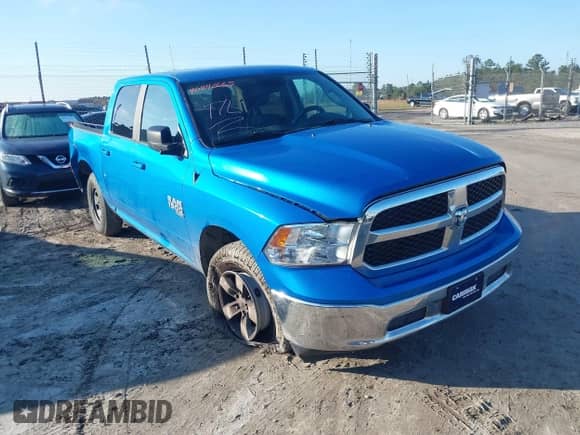 2021 Ram 1500 SLT z VIN 1C6RR7LG7MS543071, wystawiony jako IAAI lot #40840665 z przebiegiem 92 794 mil mil oraz . Historia ofert i sprzedaży dostępna na DreamBid. Obrazek 1.