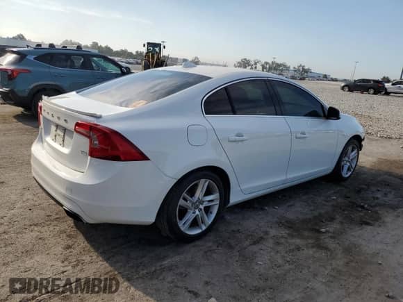 2014 Volvo S60 T5 с VIN YV1612FS5E2274294, выставлен на аукционе Copart как лот 82078085 с пробегом 140 398 миль миль и Списание • Salvage title. История ставок и продаж доступна на DreamBid. Изображение 3.